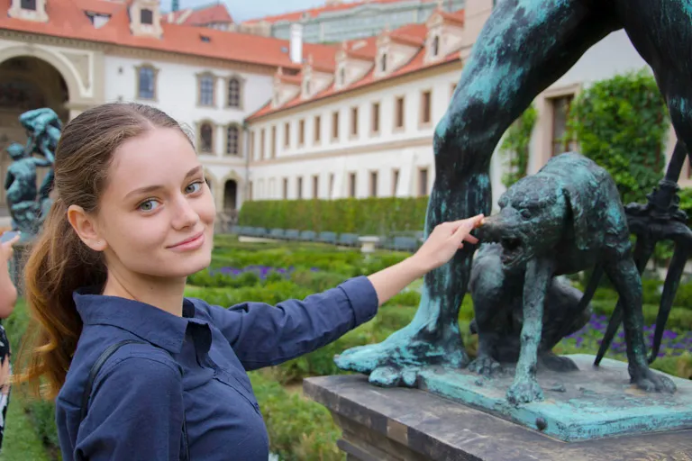 Film Your Own Movie Team Building, employee filming a scene with statue
